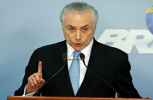 Presidente e ministros são investigados no inquérito do 'quadrilhão' do PMDB na Câmara (Foto: Sergio Lima l AFP)