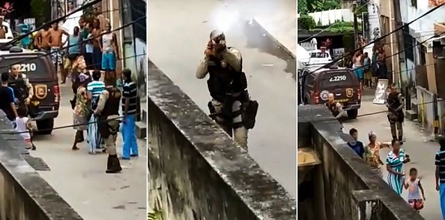 Após o tiro, os moradores se afastam e um outro policial vai na direção deles e efetua pelo menos mais três disparos (Foto: Reprodução)