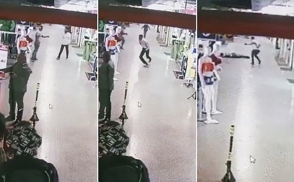 PM foi pego de surpresa por dois bandidos que estavam na loja (Foto: Reprodução)