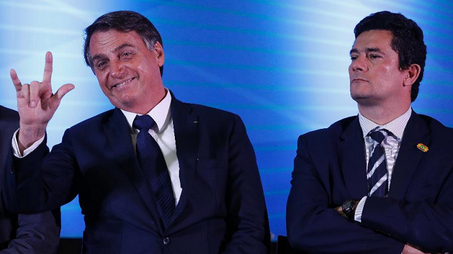 O presidente Jair Bolsonaro e o ministro da Justiça e Segurança Pública, Sergio Moro (Foto: Rodolfo Buhrer | Foto Arena | Estadão Conteúdo)