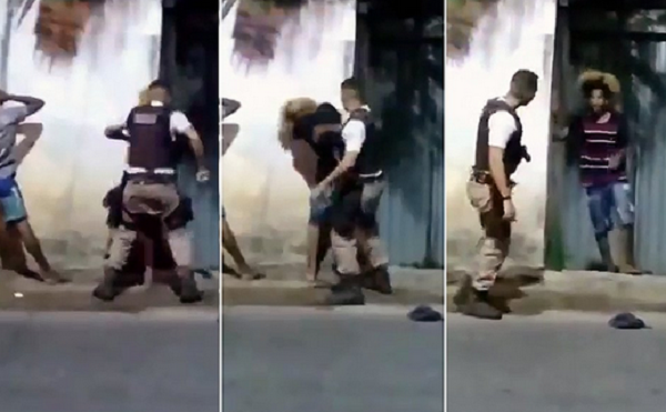 Policial esmurra jovem negro que estava sendo revistado ao lado de outro homem (Foto: Reprodução)