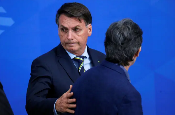 Bolsonaro e Teich: ministro pediu exoneração após desentendimentos com o presidente (Foto: Adriano Machado | Reuters)