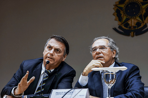 Presidente Jair Bolsonaro e o ministro da Economia, Paulo Guedes: ministro poderá negociar com o Congresso a criação de uma nova CPMF, em substituição a outros impostos (Foto: Isac Nóbrega | PR | Flickr)