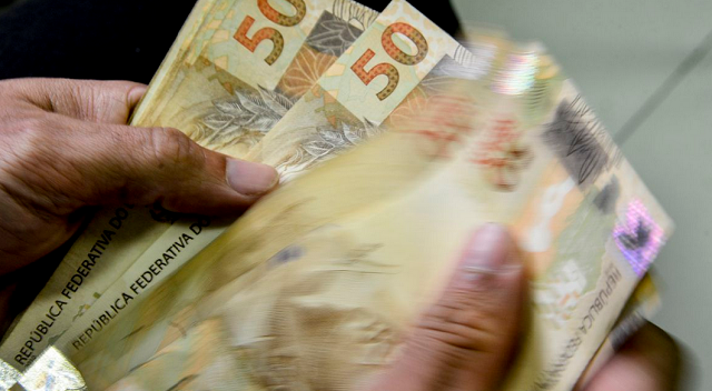 Caixa iniciou pagamento em 15 de fevereiro e prosseguirá com a liberação até 17 de julho (Foto: Marcello Casal Jr/Agência Brasil)