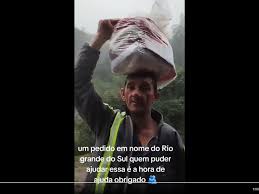 Altair Fernando Pape, pai de Leonardo. O vídeo mostra que moradores do município de Agudo seguem ilhados e com dificuldades para buscar itens de necessidade básica. Créditos: Reprodução de vídeo