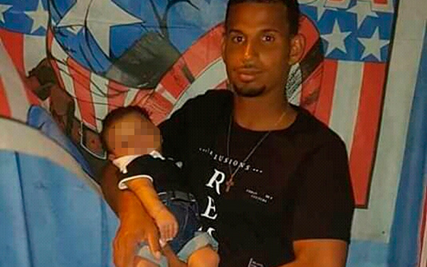 Arthur pulou no chão para proteger filho de quatro meses, mas foi baleado na cabeça. A morte cerebral foi confirmada nesta segunda-feira (20) (Foto: Reprodução)